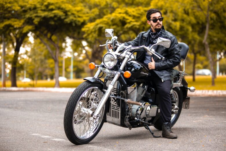 photo of man riding motorcycle