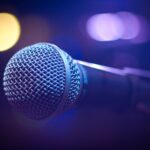 tilt shift photograph of gray and black microphone
