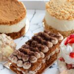 various types of tasty deserts in container
