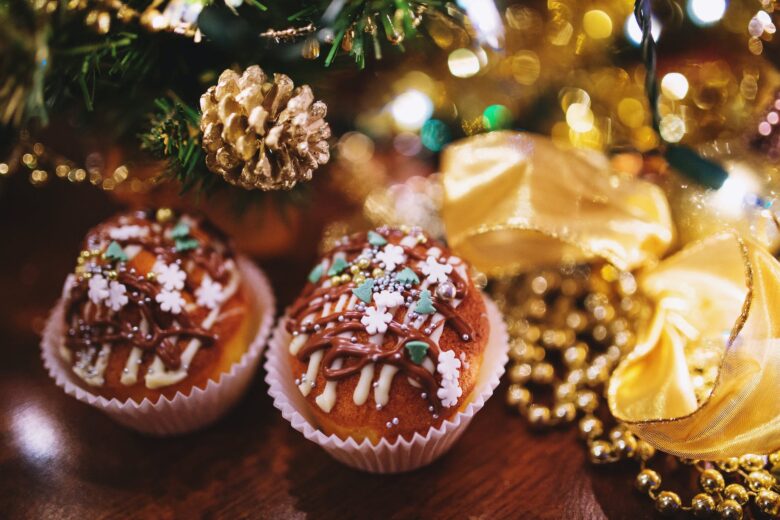 two cupcakes with winter decor