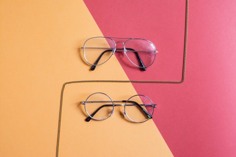 two clear eyeglasses with gray frames