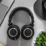 black wireless headphones on white table