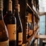 photo of wine bottles on rack